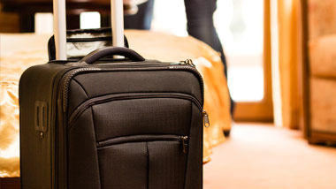 suitcase in hotel room